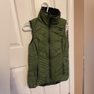 The North Face reversible vest in olive green size small